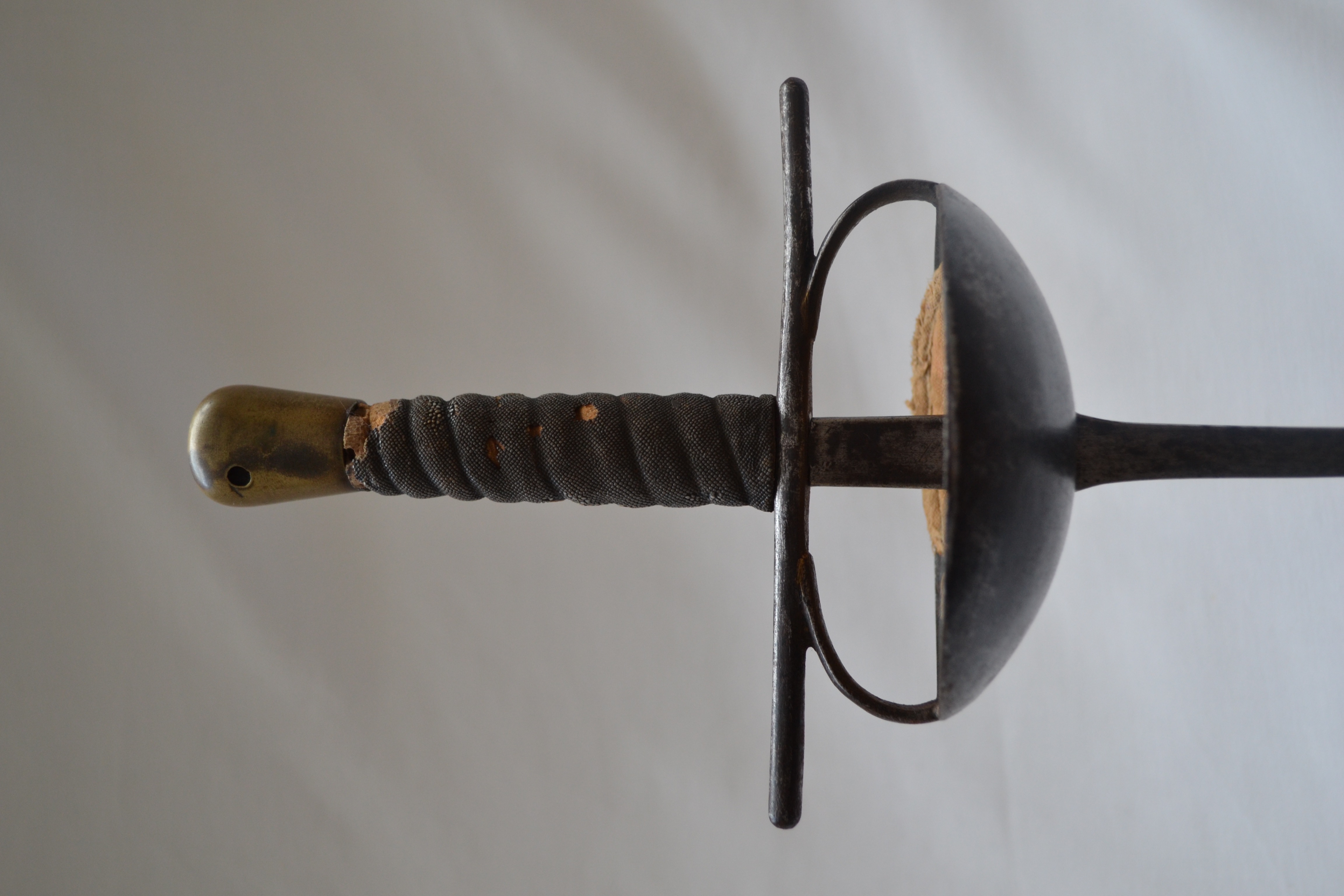 Fig. 16. Smarra (heavy foil), circa, late 1800s. Mounted with Sharkskin grip and a stiff heavy blade 37 inches from guard to point.